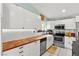Bright kitchen with butcher block counters, white cabinets, and stainless steel appliances at 2426 La Pluma St, Henderson, NV 89014