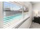 Window view of a refreshing backyard pool, offering a glimpse of outdoor relaxation and leisure at 2426 La Pluma St, Henderson, NV 89014
