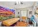 Bedroom with orange carpet and decor at 2460 Old Forge Ln # 48, Las Vegas, NV 89121