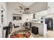 Open living area with dining space, and views to the updated kitchen at 2460 Old Forge Ln # 48, Las Vegas, NV 89121