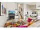 Inviting living room with fireplace, stylish decor, and staircase access at 2460 Old Forge Ln # 48, Las Vegas, NV 89121