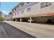 View of covered parking structure with clearly marked height restriction at 2460 Old Forge Ln # 48, Las Vegas, NV 89121
