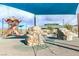 Modern playground with climbing structures, slides and sunshades offers community fun at 2871 Tanager Hill St, Henderson, NV 89044