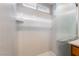 Shower with frosted sliding door and window at 2871 Tanager Hill St, Henderson, NV 89044