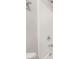 Close up of a white shower with chrome hardware at 2871 Tanager Hill St, Henderson, NV 89044
