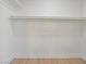 A well-lit closet with a hanging rod and ample storage space at 2894 Matese Dr, Henderson, NV 89052