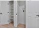 Walk-in closet with built-in shelving and modern doors and hardware at 2894 Matese Dr, Henderson, NV 89052