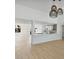 Open-concept living space with modern lighting and luxury vinyl flooring at 2894 Matese Dr, Henderson, NV 89052