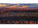 Panoramic twilight view of a vibrant city skyline and residential neighborhood, with glowing city lights at 2901 Josephine Dr, Henderson, NV 89044