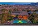 Aerial view of a luxurious backyard with a pool, spa, and manicured landscaping in a desirable neighborhood at 2901 Josephine Dr, Henderson, NV 89044