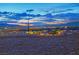 Panoramic city skyline view from hilltop homes in a desert landscape at sunset at 2901 Josephine Dr, Henderson, NV 89044
