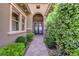 Welcoming front entrance with stone accents, manicured bushes, and double doors providing curb appeal at 2901 Josephine Dr, Henderson, NV 89044