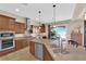 Bright kitchen with stainless steel appliances, large island, and ample cabinet space at 2901 Josephine Dr, Henderson, NV 89044