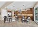 Open kitchen with stainless steel appliances, center island, and breakfast nook at 2901 Josephine Dr, Henderson, NV 89044