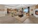 Spacious living room with a fireplace, large windows, and open layout, perfect for relaxation and entertaining at 2901 Josephine Dr, Henderson, NV 89044