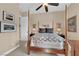 Main bedroom with ceiling fan, ensuite bathroom, and neutral decor at 2901 Josephine Dr, Henderson, NV 89044