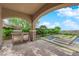 Inviting outdoor kitchen with a built-in grill, complemented by a pool and landscaped backyard at 2901 Josephine Dr, Henderson, NV 89044