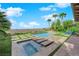 Luxurious backyard featuring a pool, spa, stepping stones, and manicured landscaping at 2901 Josephine Dr, Henderson, NV 89044