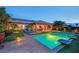 Elegant backyard with a pool and luxurious outdoor living space at 2901 Josephine Dr, Henderson, NV 89044