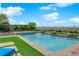 Backyard pool with manicured landscaping offering a great space for relaxing and entertaining at 2901 Josephine Dr, Henderson, NV 89044