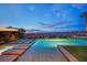 Backyard swimming pool and integrated spa offer the perfect retreat with city views at 2901 Josephine Dr, Henderson, NV 89044