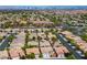 Wide aerial perspective of single-story homes with desert landscaping and a scenic backdrop at 3278 Turning Bridge St, Las Vegas, NV 89135