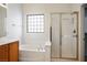 Bathroom features a separate tub and glass-enclosed shower with a view at 3278 Turning Bridge St, Las Vegas, NV 89135