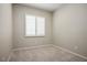 This cozy bedroom includes a window with shutters, neutral walls and carpet flooring at 3278 Turning Bridge St, Las Vegas, NV 89135