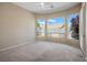Bright bedroom with large windows offering plenty of natural light and backyard views at 3278 Turning Bridge St, Las Vegas, NV 89135