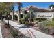 Landscaped entrance to the Castlewood community featuring lush plants and serene surroundings at 3278 Turning Bridge St, Las Vegas, NV 89135