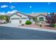 Charming single-story home with a three-car garage and well-maintained landscaping at 3278 Turning Bridge St, Las Vegas, NV 89135
