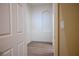 Hallway showcases hard surface floors, white trim, and a recessed wall with built-in shelving at 3278 Turning Bridge St, Las Vegas, NV 89135