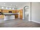 Open-concept kitchen with granite countertops, wooden cabinets, and sleek appliances, ideal for entertaining at 3278 Turning Bridge St, Las Vegas, NV 89135
