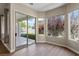 Light-filled living room with sliding doors and large windows showcases access to the outdoor area at 3278 Turning Bridge St, Las Vegas, NV 89135