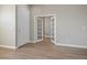 A light-filled office with french doors, shutters, and wood-look floors at 3278 Turning Bridge St, Las Vegas, NV 89135