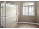 Bright office space featuring wood floors, shutters, and an open doorway at 3278 Turning Bridge St, Las Vegas, NV 89135