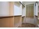 Spacious walk-in closet with built-in shelving and hanging rods, offering ample storage space at 3278 Turning Bridge St, Las Vegas, NV 89135