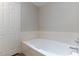 Bright bathroom showing bathtub and tiled wall at 3510 Judah Way, Las Vegas, NV 89147