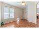 Bedroom features light-filled window, closet, and hardwood floors at 3510 Judah Way, Las Vegas, NV 89147
