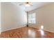 Bright bedroom features wood floors, a ceiling fan, and a window with views at 3510 Judah Way, Las Vegas, NV 89147