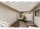 Cozy covered front porch with decorative brick accents and white trim at 3510 Judah Way, Las Vegas, NV 89147