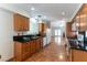 Lovely kitchen featuring granite countertops, wood cabinets, and stainless steel appliances at 3510 Judah Way, Las Vegas, NV 89147