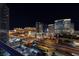Expansive city view showcasing the illuminated Las Vegas skyline with prominent hotels and bustling roadways at night at 4575 Dean Martin Dr # 1909, Las Vegas, NV 89103