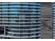 Striking exterior view of the high-rise residence boasting walls of windows and modern design at 4575 Dean Martin Dr # 1909, Las Vegas, NV 89103