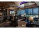 Modern living room with a city view, marble floors, and a stylish bar area, perfect for entertaining at 4575 Dean Martin Dr # 1909, Las Vegas, NV 89103