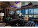 Modern living room featuring a city view, marble floors, ambient lighting, and a cozy seating arrangement at 4575 Dean Martin Dr # 1909, Las Vegas, NV 89103