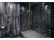 Luxurious shower featuring marble walls, glass door, gold hardware, and a rainfall showerhead at 4575 Dean Martin Dr # 1909, Las Vegas, NV 89103