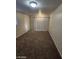 Cozy bedroom with neutral walls, carpet and a sliding door, maximizing space at 4808 Everman Dr, Las Vegas, NV 89122