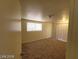 A sunlit bedroom with neutral walls is ready for personal touches at 4808 Everman Dr, Las Vegas, NV 89122