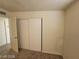 Cozy bedroom with sliding closet doors at 4808 Everman Dr, Las Vegas, NV 89122